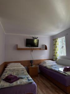 Posteľ alebo postele v izbe v ubytovaní Rancho Panderoza