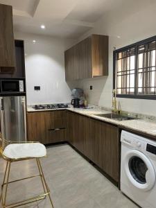 Kuchyň nebo kuchyňský kout v ubytování Accommodation Guru + 8 fotografií