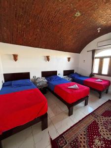 Voodi või voodid majutusasutuse Ajwa Guest House toas