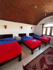 Voodi või voodid majutusasutuse Ajwa Guest House toas