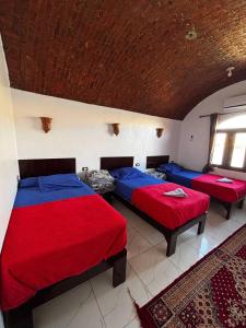 Voodi või voodid majutusasutuse Ajwa Guest House toas