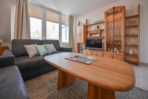 TV a/nebo společenská místnost v ubytování FeWo Gronemeyer - Nr 35 - Strandhotel