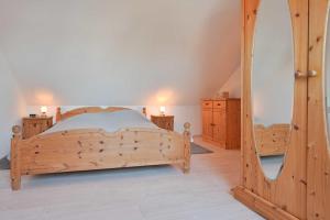 Postel nebo postele na pokoji v ubytování FeWo Gronemeyer - Nr 35 - Strandhotel
