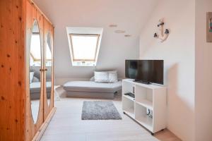 Postel nebo postele na pokoji v ubytování FeWo Gronemeyer - Nr 35 - Strandhotel
