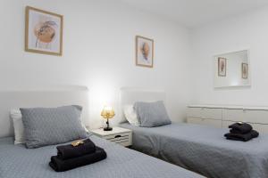 Postel nebo postele na pokoji v ubytování Mandarina 5 + 25 fotografií