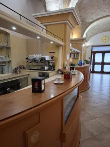 Kuchyň nebo kuchyňský kout v ubytování Hotel 4 Mori