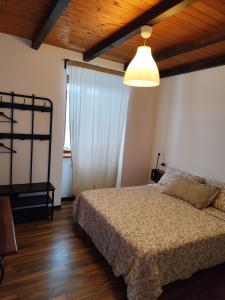 Ένα ή περισσότερα κρεβάτια σε δωμάτιο στο B & b da Gisella - Agriturismo Podere Barzia