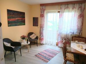 Posedenie v ubytovaní Haus Christof private Ferienwohnungen Nähe Wörthersee und Ossiacher See
