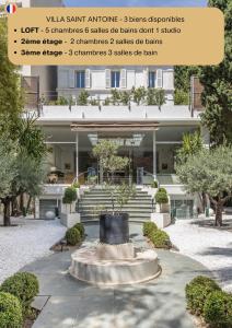 een bord voor een gebouw met een fontein bij Heart of Cannes Luxury Stay - Steps from Beach & Palais in Cannes