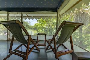 Dera Baghdarrah Nature Retreat Udaipur的阳台或露台