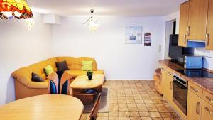 Kuchyň nebo kuchyňský kout v ubytování Ferienwohnung Eichenweg - Wohnung I