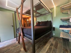 Postel nebo postele na pokoji v ubytování Villa Désir Village Naturiste Jardin et Jacuzzi + 9 fotografií