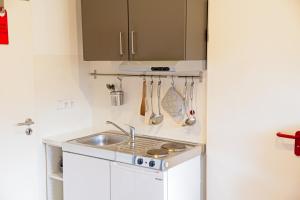 Küche/Küchenzeile in der Unterkunft Boardinghouse Steinen