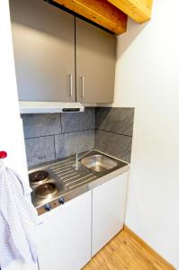 Küche/Küchenzeile in der Unterkunft Boardinghouse Steinen
