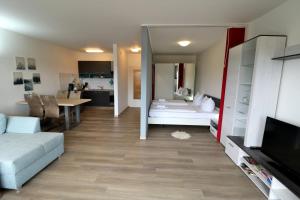 Postel nebo postele na pokoji v ubytování Apartment C46 "Valentine" im Haus Feldbergblick, Lenzkirch, Hochschwarzwaldkarte, Innenpool, Sauna