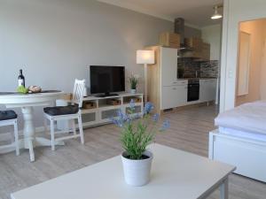 Η κουζίνα ή μικρή κουζίνα στο Strandhotel Whg 70 Landblick