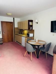 Kuchyň nebo kuchyňský kout v ubytování Apartamenty Baltic Sea Kasprowicza 314