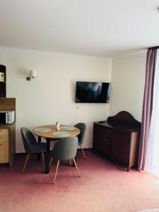 TV a/nebo společenská místnost v ubytování Apartamenty Baltic Sea Kasprowicza 314