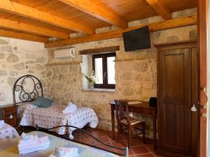 TV a/nebo společenská místnost v ubytování Country House Antiche Dimore