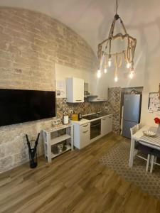 A kitchen or kitchenette at Cà de Mess