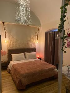 A bed or beds in a room at Cà de Mess