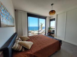 Ένα ή περισσότερα κρεβάτια σε δωμάτιο στο Luxury penthhouse sea views Blue Suite 3401 +40 φωτογραφίες