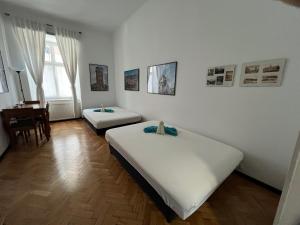 Posteľ alebo postele v izbe v ubytovaní Home in Krakow Silvio's Apartments