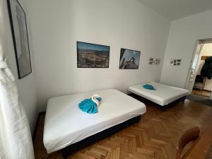 Posteľ alebo postele v izbe v ubytovaní Home in Krakow Silvio's Apartments