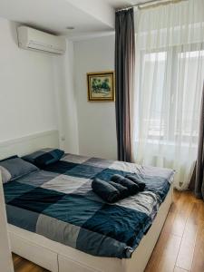 Ένα ή περισσότερα κρεβάτια σε δωμάτιο στο Zen Sunset Loft