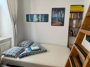 Posteľ alebo postele v izbe v ubytovaní Home in Krakow Silvio's Apartments