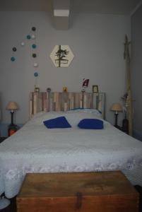 Postel nebo postele na pokoji v ubytování L'arras Square