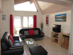 Μια τηλεόραση ή/και κέντρο ψυχαγωγίας στο Aurora Appartement WEISSMIES by FeWo-PLAN SAAS232