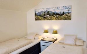 En eller flere senge i et værelse på Romantik -302-