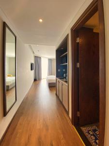 Ein Bett oder Betten in einem Zimmer der Unterkunft Apec Mandala Ocean Retreat - Mui Ne