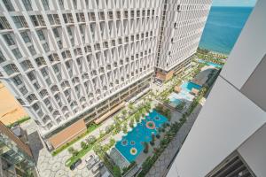 Der Swimmingpool an oder in der Nähe von Apec Mandala Ocean Retreat - Mui Ne
