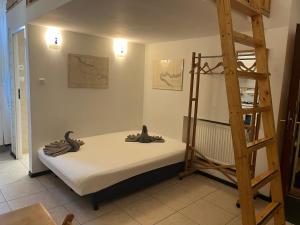 Posteľ alebo postele v izbe v ubytovaní Home in Krakow Silvio's Apartments