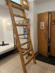 Poschodová posteľ alebo postele v izbe v ubytovaní Home in Krakow Silvio's Apartments