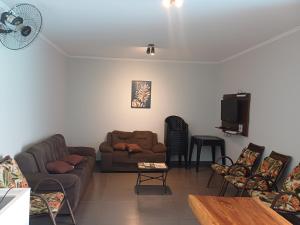 Posezení v ubytování casa inteira com 3 suites e área de lazer