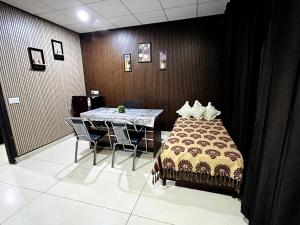 Ansh Abode客房内的一张或多张床位