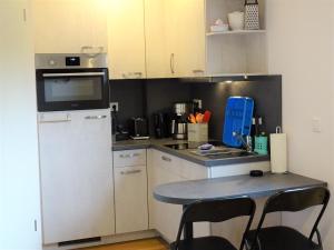 Kuchyň nebo kuchyňský kout v ubytování Lütt Plambeck-Appartement Melanie EG 2