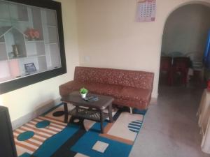 Posezení v ubytování PRASHANTH Home Stay