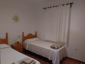 Posteľ alebo postele v izbe v ubytovaní Casas Sol & Luna