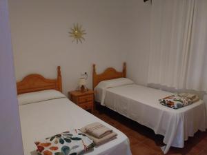Posteľ alebo postele v izbe v ubytovaní Casas Sol & Luna