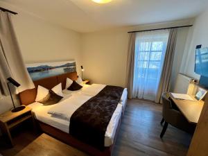 Postel nebo postele na pokoji v ubytování Hotel Oberwirt + 30 fotografií