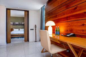 Noom Hotel Dakar Sea Plaza, a member of Radisson Individuals客房内的一张或多张床位