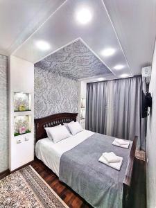 Postel nebo postele na pokoji v ubytování Center of Tashkent near "Minor" metro station, Premium Location