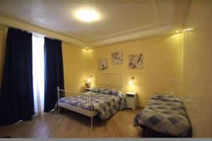 Posteľ alebo postele v izbe v ubytovaní B&B Rome With Love