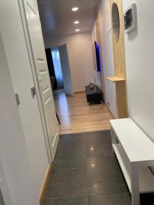 TV a/nebo společenská místnost v ubytování Puiestee apartment + 4 fotografie