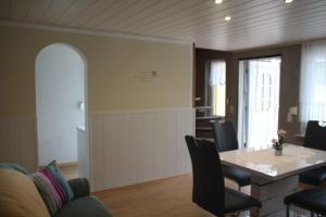 Posezení v ubytování Ferienhaus Mecklenburgische Seenplatte + 5 fotografií