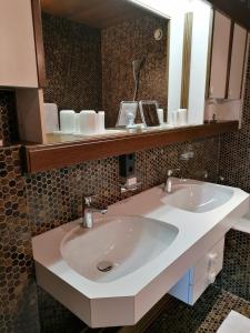 Koupelna v ubytování Hotel Garni Tannleger B&B